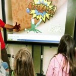 Image of children watching a cartoon about immune cells