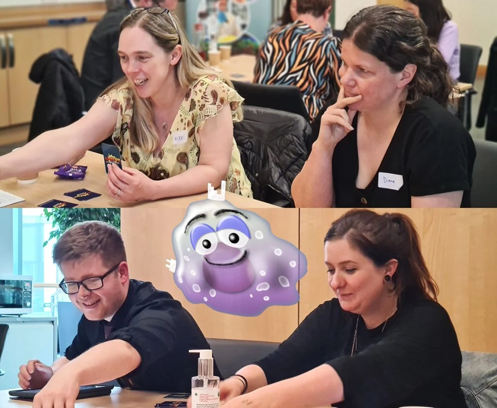 Teachers playing Supercytes card game