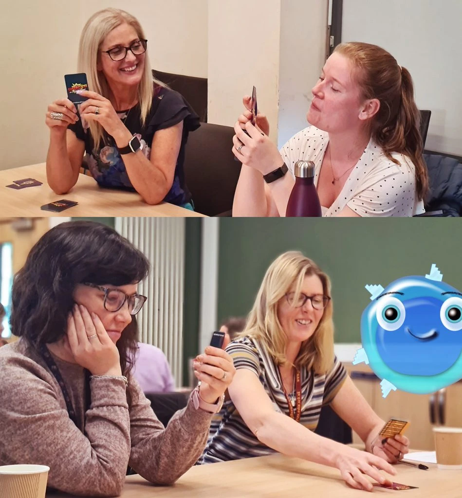Teachers playing Supercytes card game
